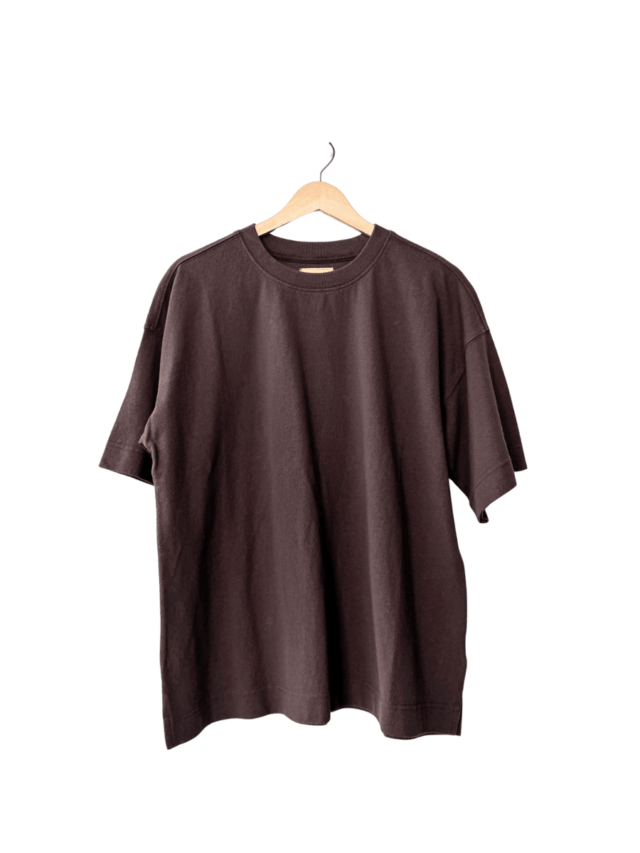 Dark brown 'Jayden Tee' t-shirt in 'Chocolate' from Le Bon Shoppe on a wooden hanger | Twentyseven Toronto
