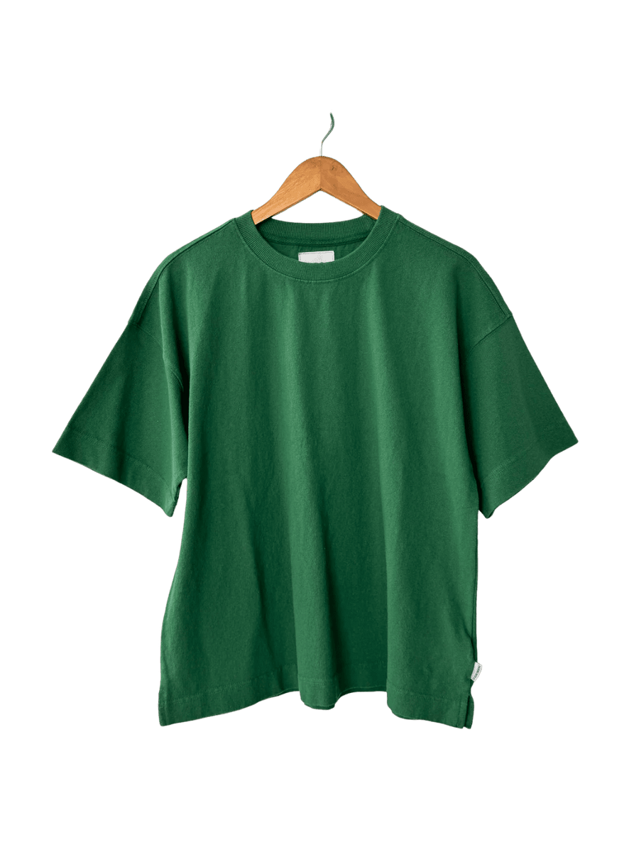 Green 'Jayden Tee' t-shirt in 'Moss Green' from Le Bon Shoppe on a wooden hanger | Twentyseven Toronto