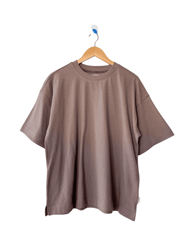 Brown 'Jayden Tee' t-shirt in 'Mushroom' from Le Bon Shoppe on a wooden hanger | Twentyseven Toronto
