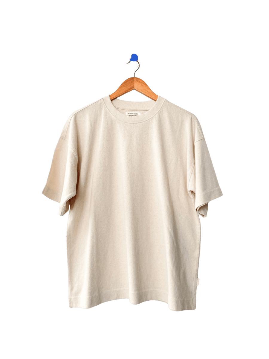 Cream 'Jayden Tee' t-shirt in 'Naturel' from Le Bon Shoppe on a wooden hanger | Twentyseven Toronto