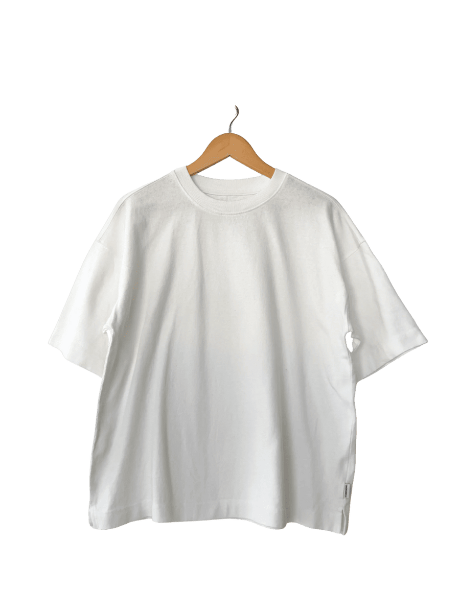White 'Jayden Tee' t-shirt from Le Bon Shoppe on a wooden hanger | Twentyseven Toronto