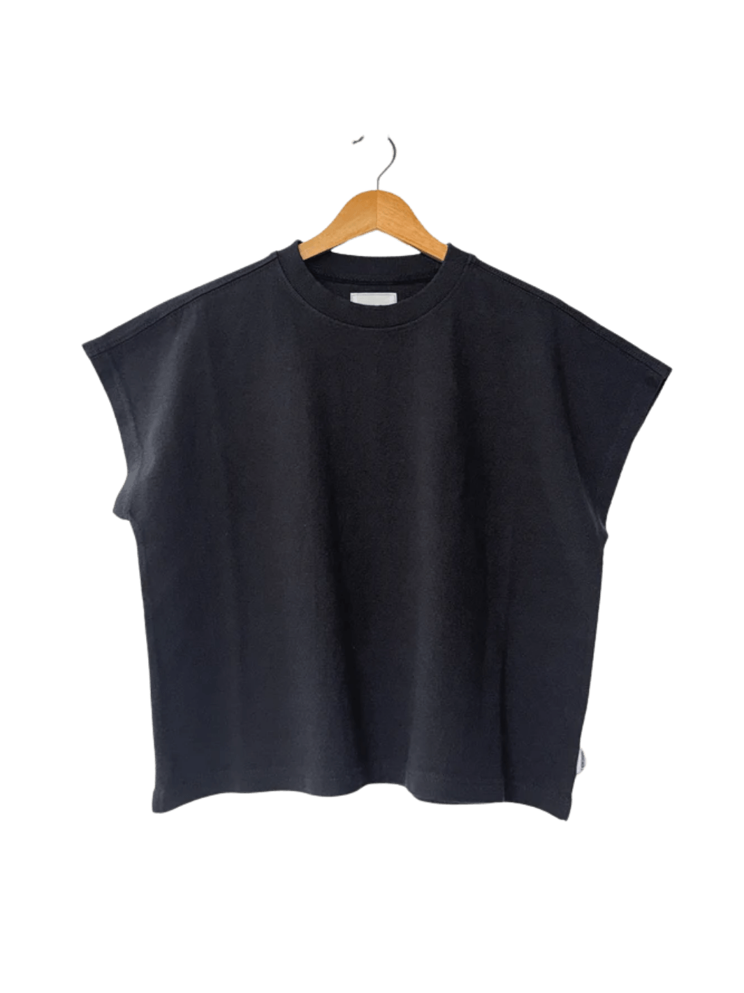 A boxy, dark charcoal grey crewneck Le Bon Shoppe Jeanne Tee in Dark Slate with extended cap sleeves hangs from a light wooden hanger | Twentyseven Toronto