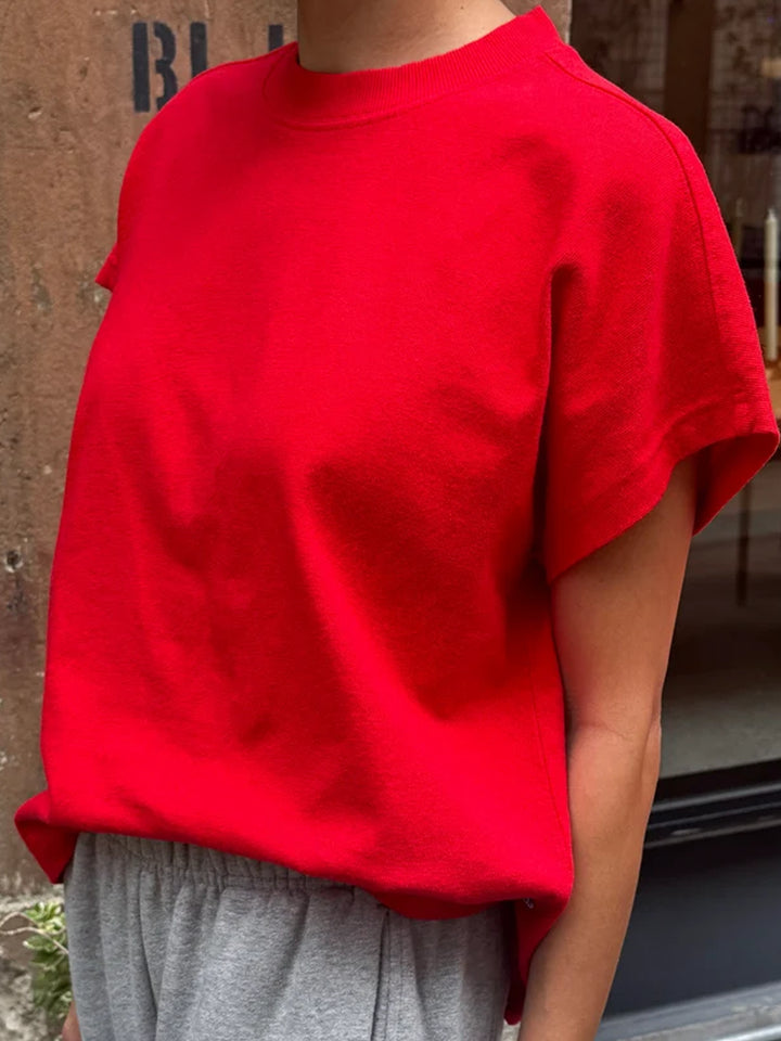 Side view of model wearing the Le Bon Shoppe Jeanne Tee in Tomato | Twentyseven Toronto