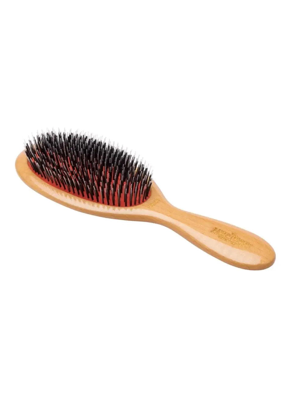 A premium wooden hairbrush with mixed boar and nylon bristles on a signature red rubber pad showcases the fine craftsmanship of the Mason Pearson Junior Lightwood Hairbrush BN2W | Twentyseven Toronto
