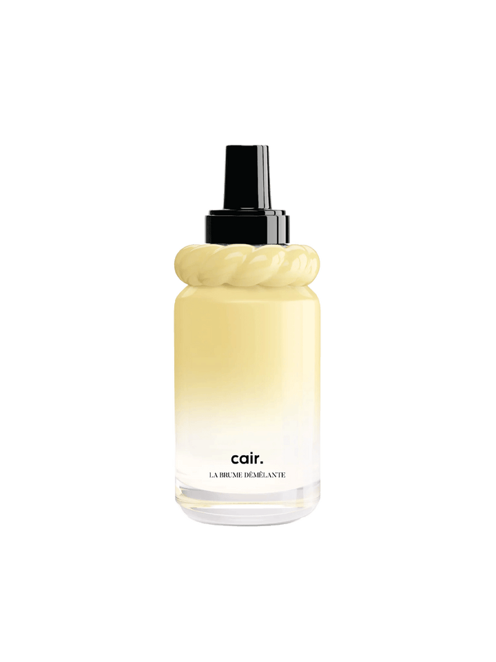 Cair Detangling Hair Mist by La Bonne Brosse in a pale yellow spray bottle with black cap | Twentyseven Toronto