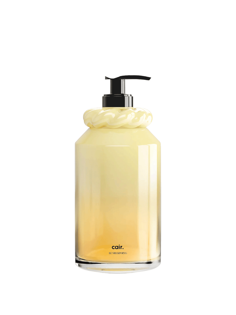 La Bonne Brosse Cair Shampoo in a yellow glass pump bottle on a white background | Twentyseven Toronto