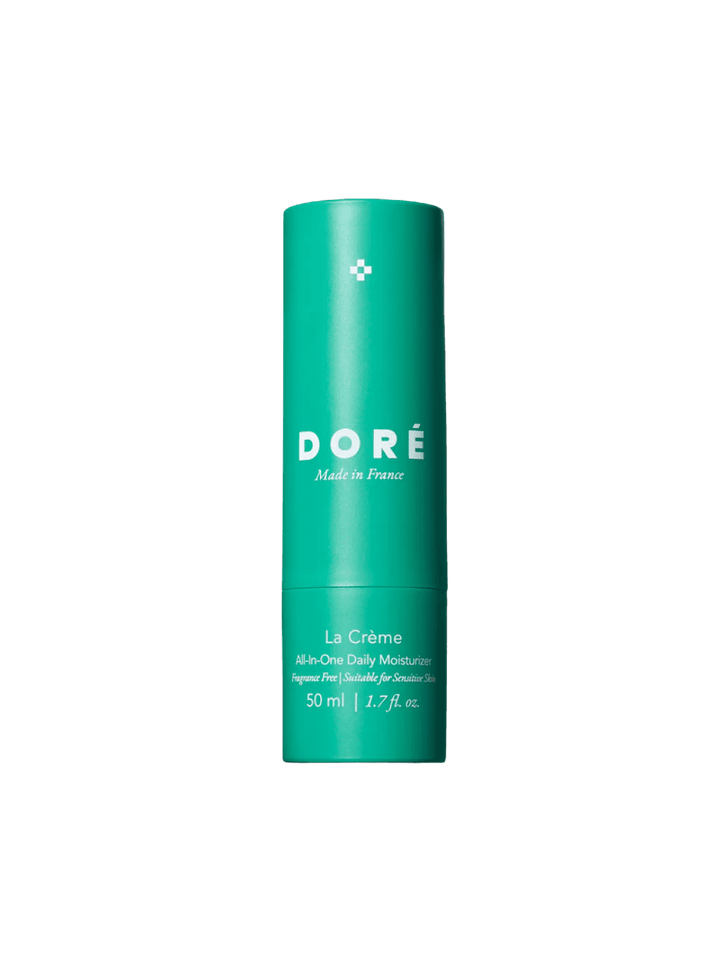 Teal bottle of Doré Skincare labeled 'La Crème All-in-One Daily Moisturizer' 50ml on a transparent background | Twentyseven Toronto