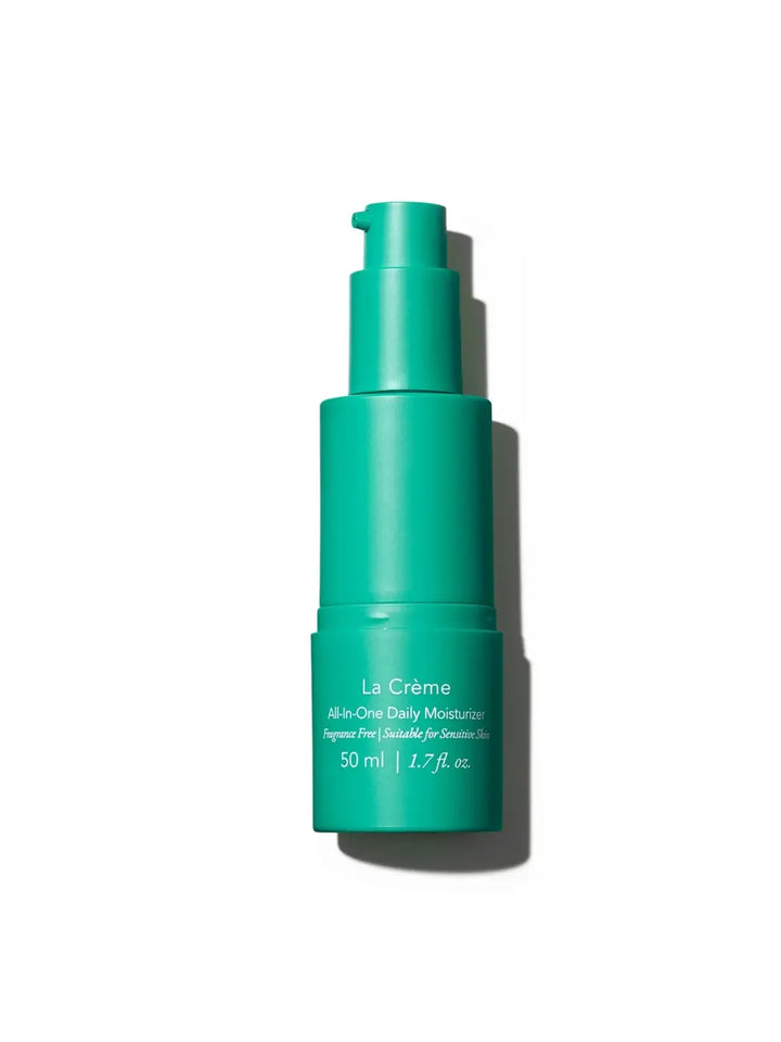 Green skincare bottle of Doré Skincare labeled 'La Creme La Crème All-in-One Daily Moisturizer' 50ml on a white background | Twentyseven Toronto
