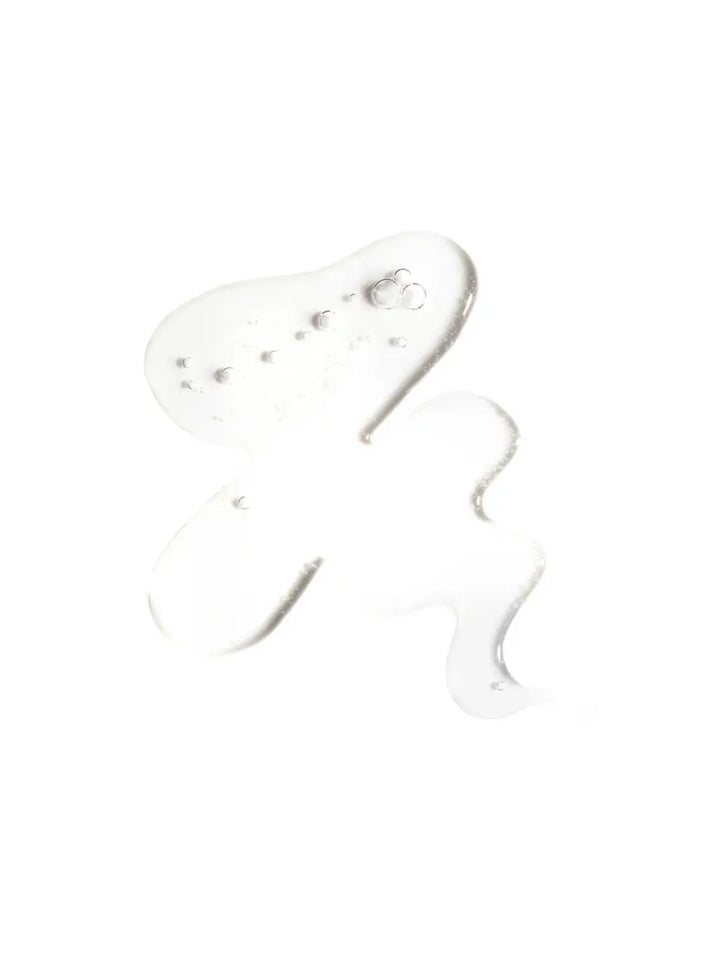 Clear liquid texture of Doré La Micellaire Botanical Cleansing Water on a white background | Twentyseven Toronto