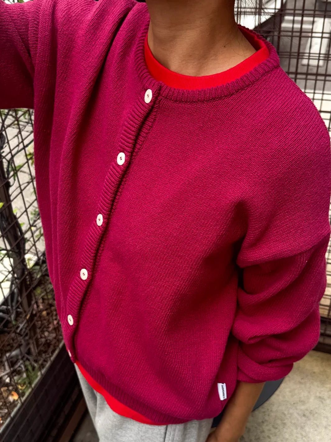 Close-up of the Le Bon Shoppe Laila Cardigan in Prune showing the button front and relaxed fit | Twentyseven Toronto