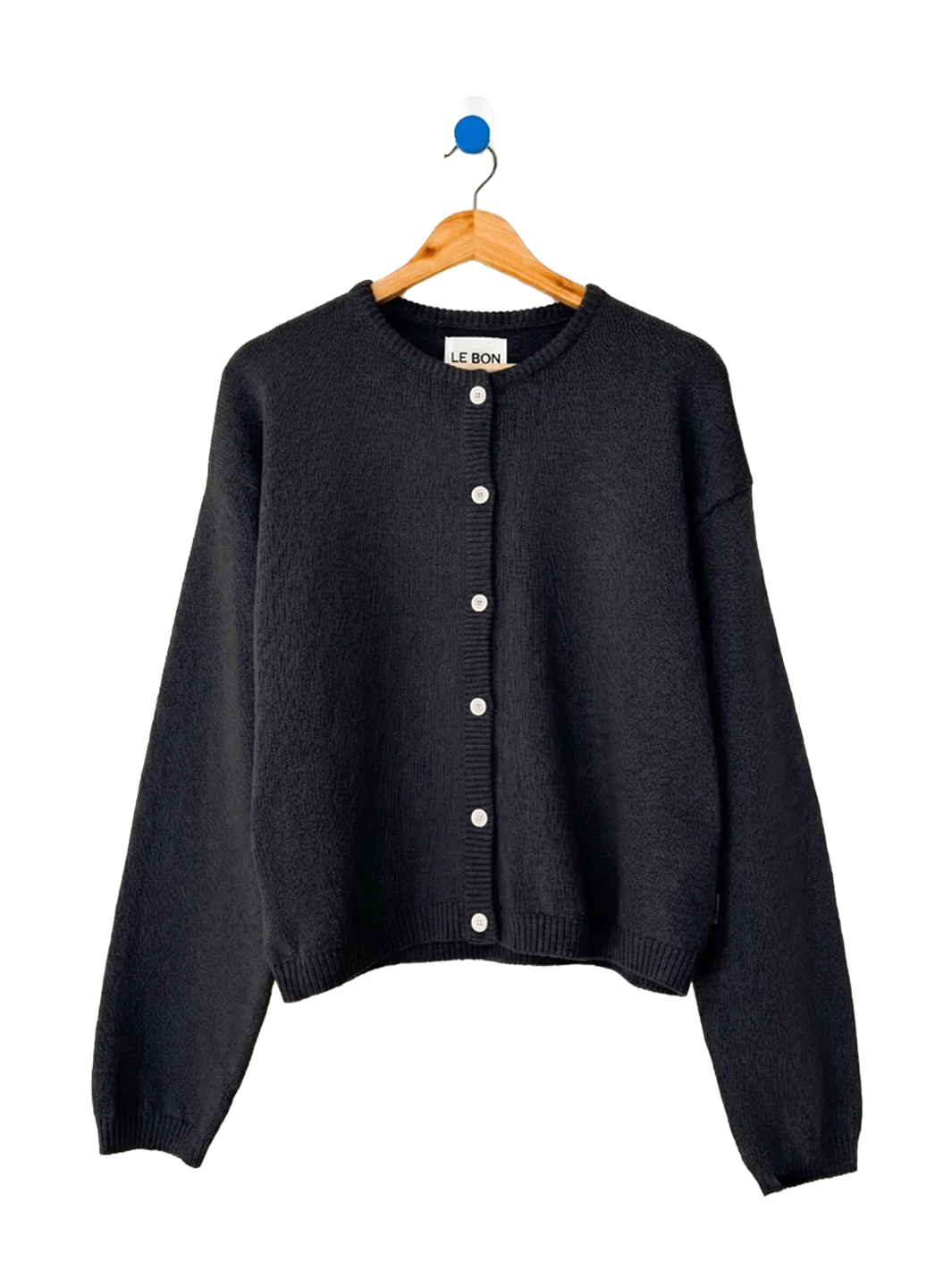 Le Bon Shoppe Laila Cardigan in Black on a wooden hanger | Twentyseven Toronto