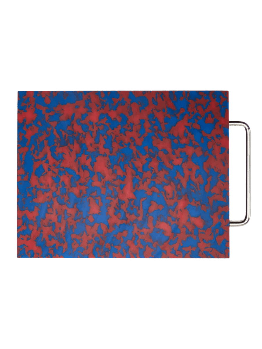 Fredericks and Mae Large Red/Blue Cutting Board showcasing its vibrant, marbled camouflage pattern and sleek silver metal handle | Twentyseven Toronto