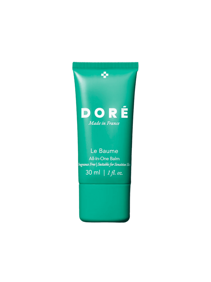 Green 30ml tube of Doré Skincare 'Le Baume' on a transparent background | Twentyseven Toronto