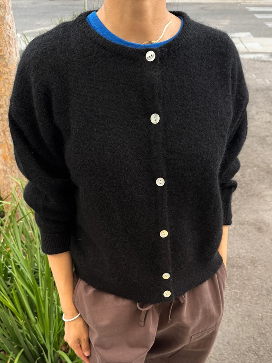 Le Bon Shoppe Ayla Mohair Cardigan in Onyx styled with relaxed trousers, featuring a crew neckline and shell button front | Twentyseven Toronto