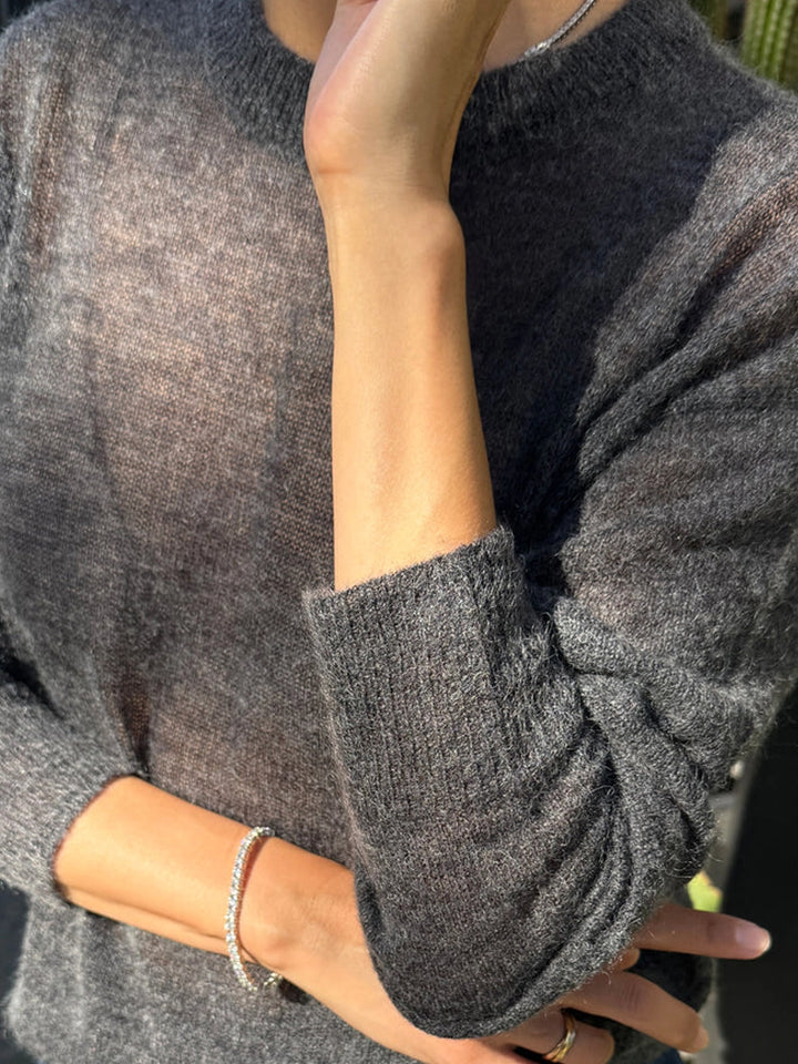 Close-up of the Le Bon Shoppe Cecile Crew Neck Mohair Sweater in Charcoal showing its soft mohair texture, crew neckline, and ribbed cuff | Twentyseven Toronto