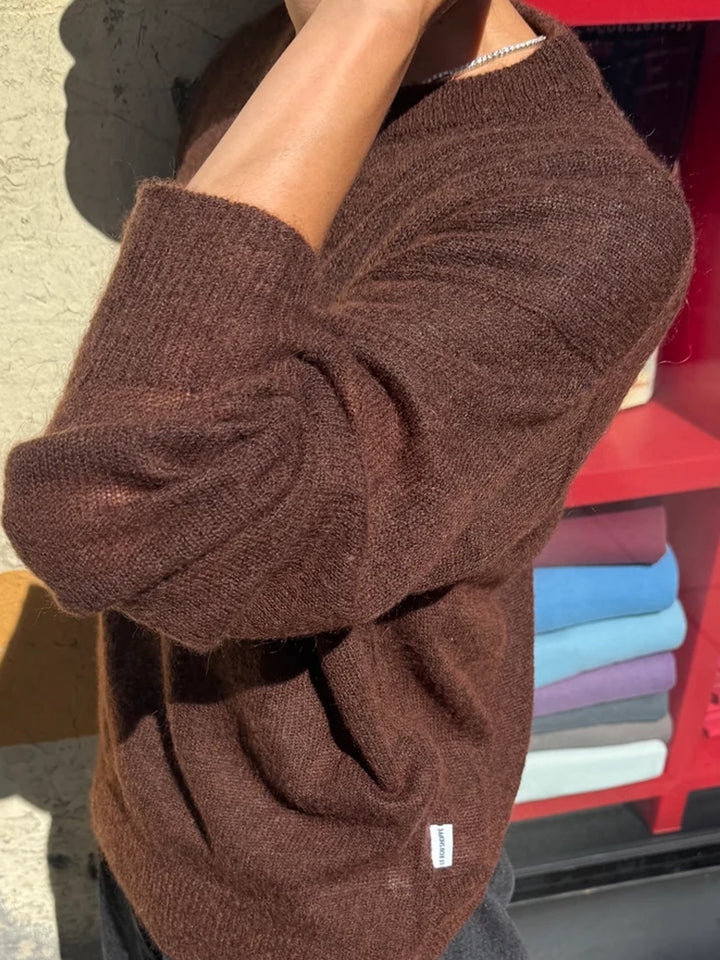 Side view of the Le Bon Shoppe Cecile Crew Neck Mohair Sweater in Espresso showing its soft, lightweight knit texture and relaxed sleeve | Twentyseven Toronto