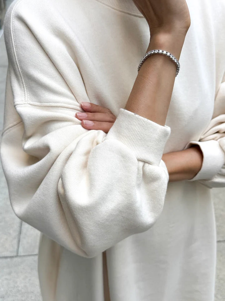 Close-up of Le Bon Shoppe French Terry Swing Dress in Natural showing balloon sleeve and ribbed cuff | Twentyseven Toronto