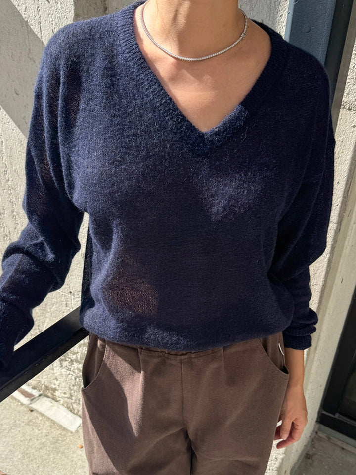 Le Bon Shoppe Matthew V-Neck Mohair Sweater in navy, styled on its own with brown trousers | Twentyseven Toronto