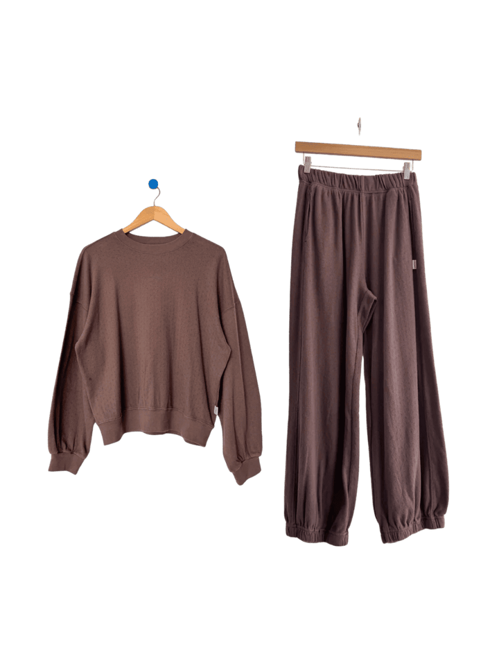 Brown Le Bon Shoppe 'Pointelle Core Sweatshirt' and 'Pointelle Balloon Pants' set in 'Chocolate' on hangers | Twentyseven Toronto