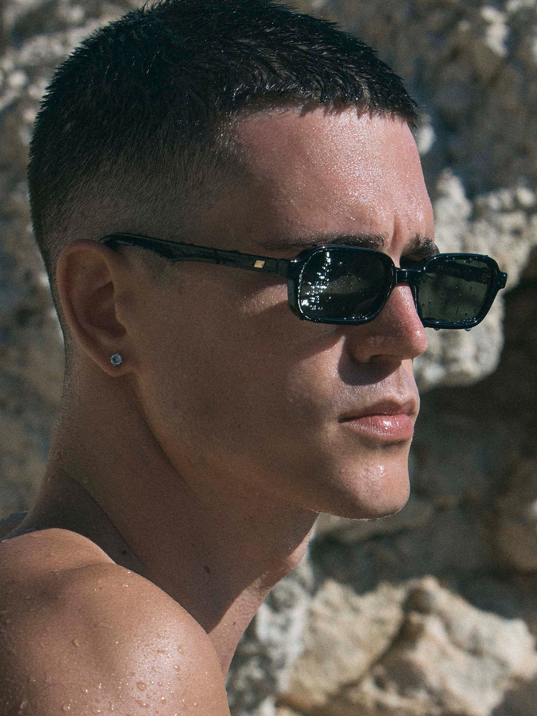 Model wearing Le Specs Pilferer black rectangular sunglasses with khaki mono lenses | Twentyseven Toronto