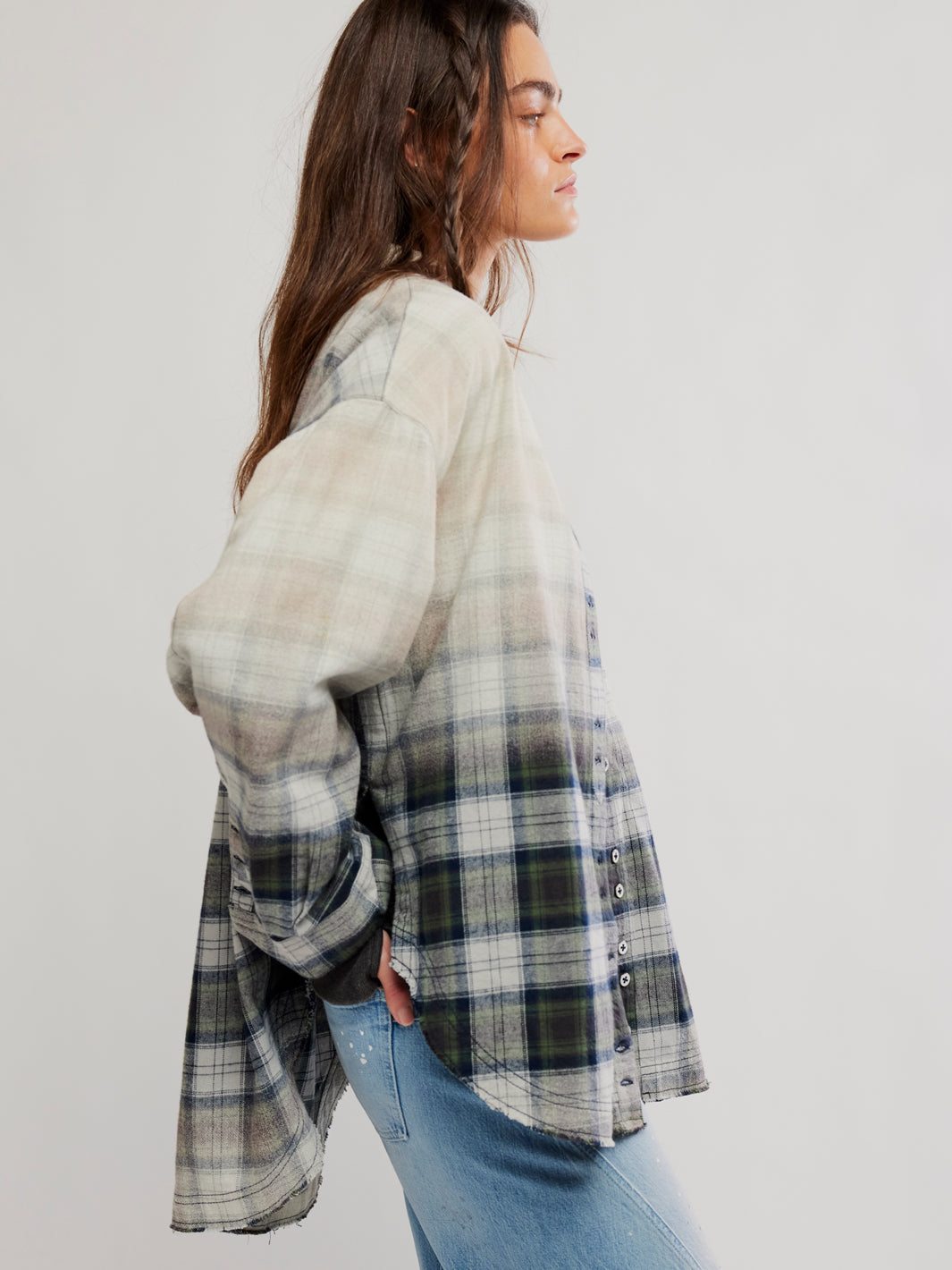 Side view of the Free People Lexi Plaid Shirt in Forest Green Combo showing its relaxed oversized silhouette and high-low hem | Twentyseven Toronto