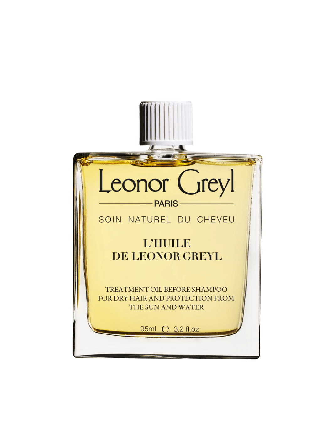 Glass bottle of gold liquid 'L’Huile de Leonor Greyl' by Leonor Greyl on a transparent background | Twentyseven Toronto