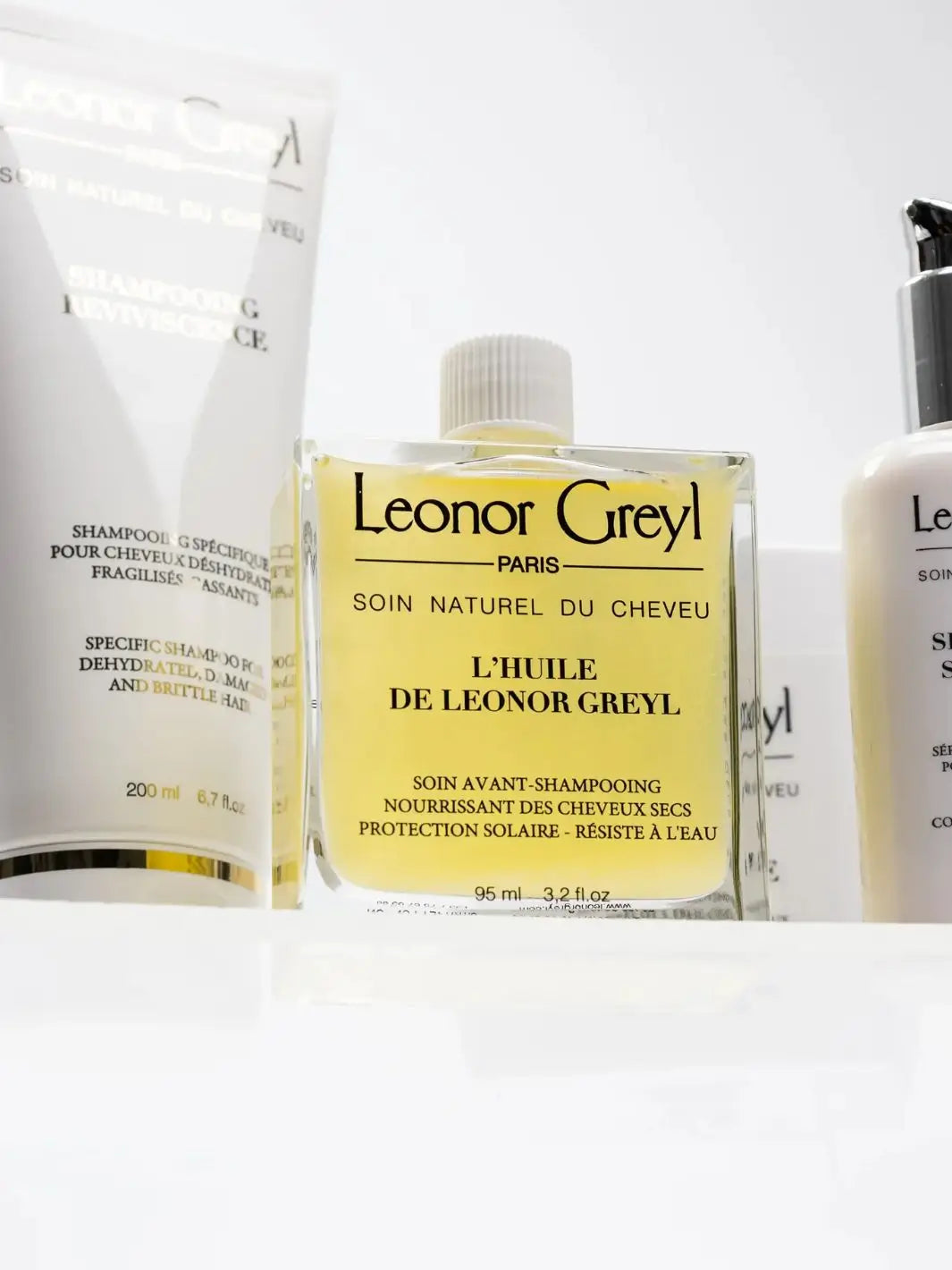 Leonor Greyl hair care products focusing on 'L’Huile de Leonor Greyl' on a white background | Twentyseven Toronto