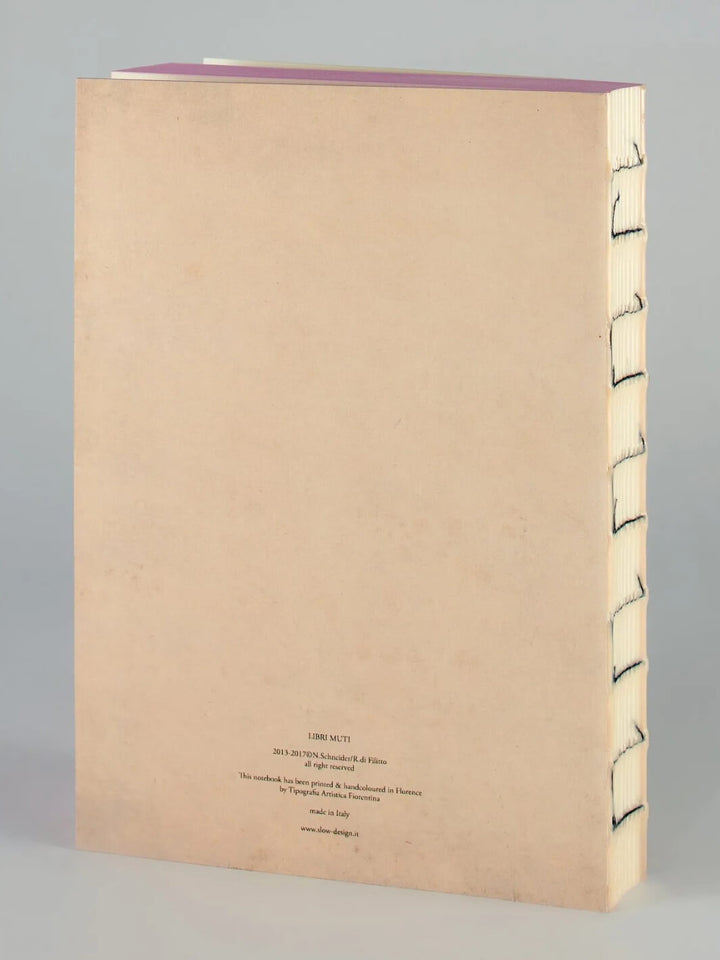 Muted pink back cover of an exposed-stitch notebook part of the L’Education Sentimentale from the Slow Design Libri Muti collection, hand-colored in Florence, Italy | Twentyseven Tornonto