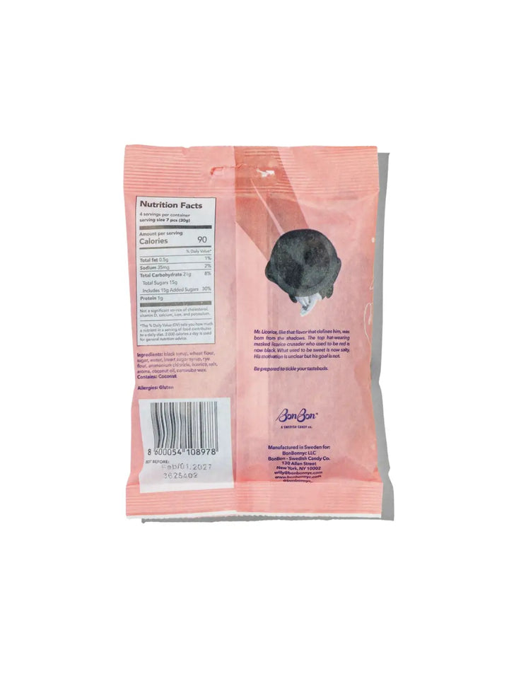 The pink back packaging of Licorice Twist Swedish Candy from BonBon NYC displays nutrition facts, an ingredients list, a barcode, and a small illustration of a character in a top hat | Twentyseven Toronto