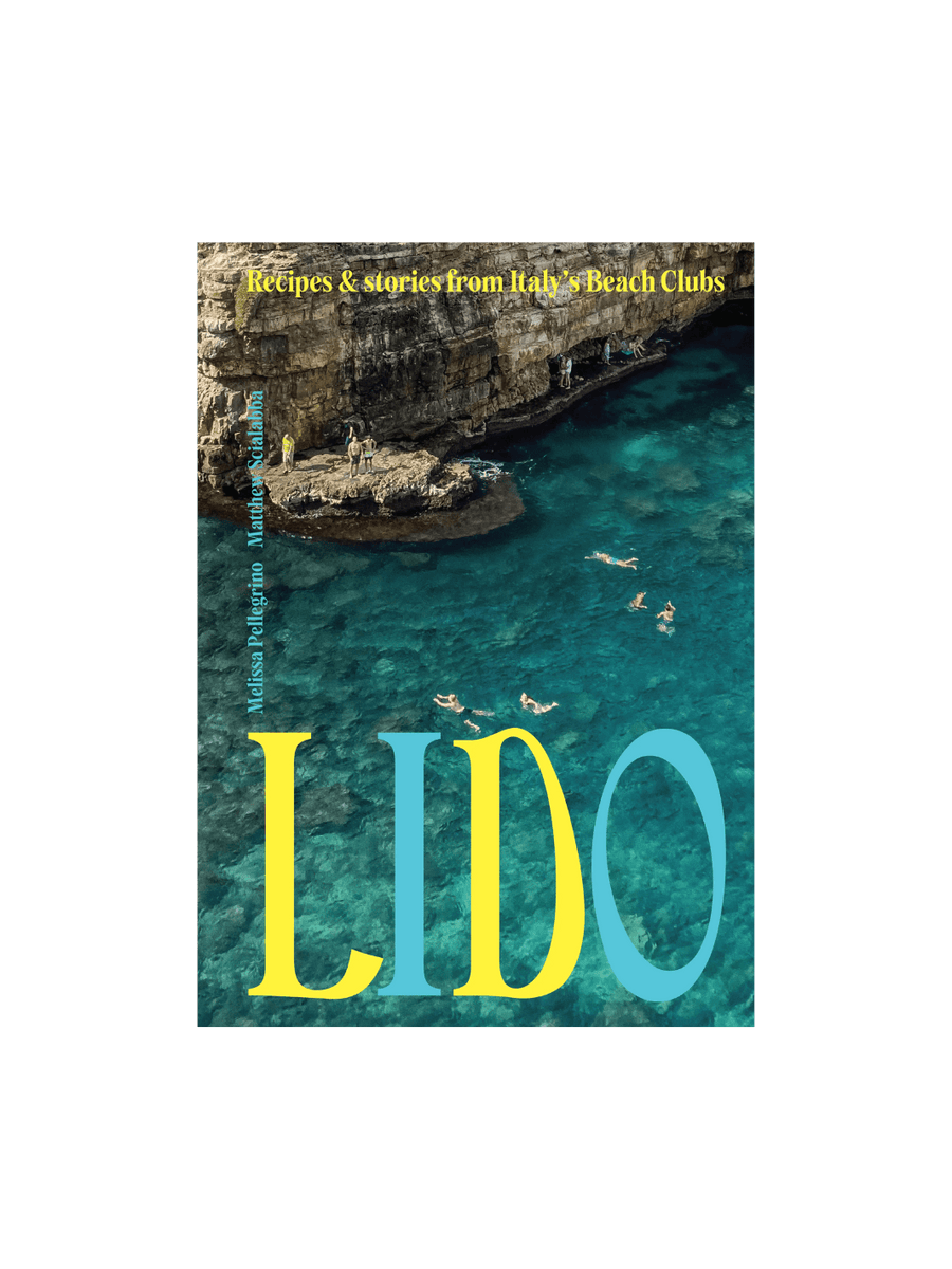 Front cover of the book Lido: Recipes and Stories from Italy's Beach Clubs by Melissa Pellegrino & Matthew Scialabba, featuring a high-angle photograph of people swimming in crystal-clear turquoise water beside a rugged cliffside | Twentyseven Toronto