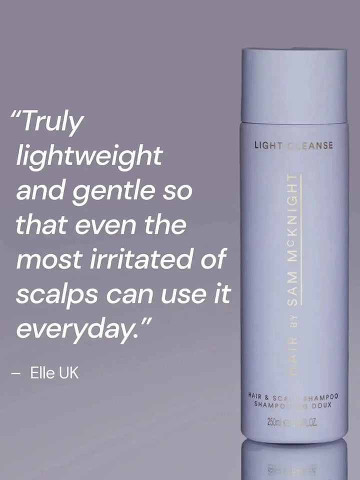 A light blue bottle of Hair by Sam McKnight Light Cleanse Hair & Scalp Shampoo stands next to a quotation from Elle UK praising its gentle formula | Twentyseven Toronto