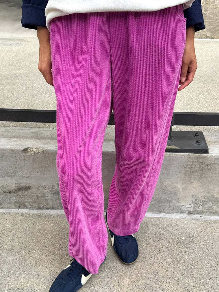 Le Bon Shoppe Soft Corduroy Arc Pants in Lilac worn outdoors, front view | Twentyseven Toronto