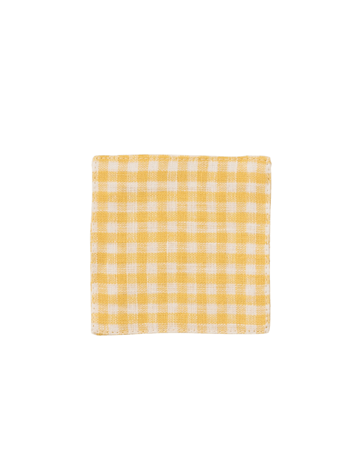 A square Fog Linen Work Linen Coaster - Keily with a yellow and white checkered linen weave against a transparent background | Twentyseven Toronto