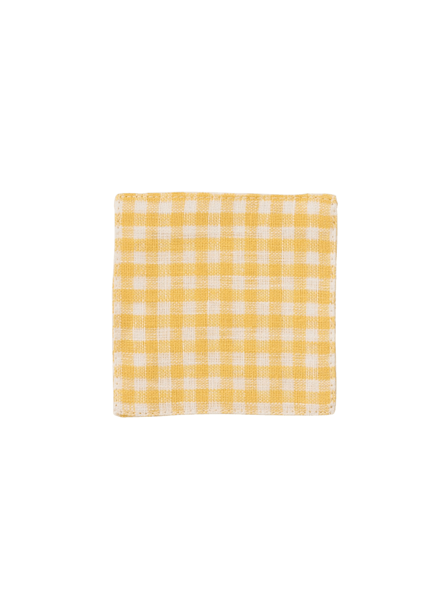 A square Fog Linen Work Linen Coaster - Keily with a yellow and white checkered linen weave against a transparent background | Twentyseven Toronto