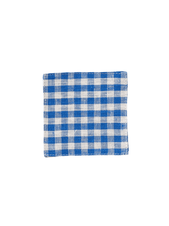 A square Fog Linen Work Linen Coaster - Keily with a blue and white checkered linen weave against a transparent background | Twentyseven Toronto