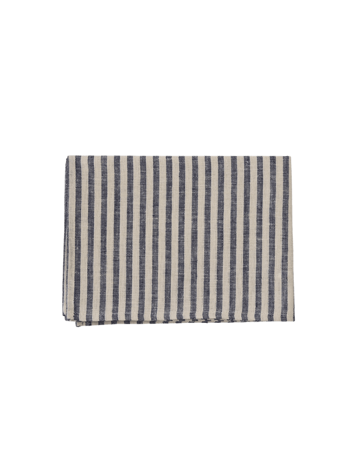 A folded Fog Linen Work Linen Kitchen Cloth - Jasper featuring a classic navy striped pattern against a transparent background | Twentyseven Toronto