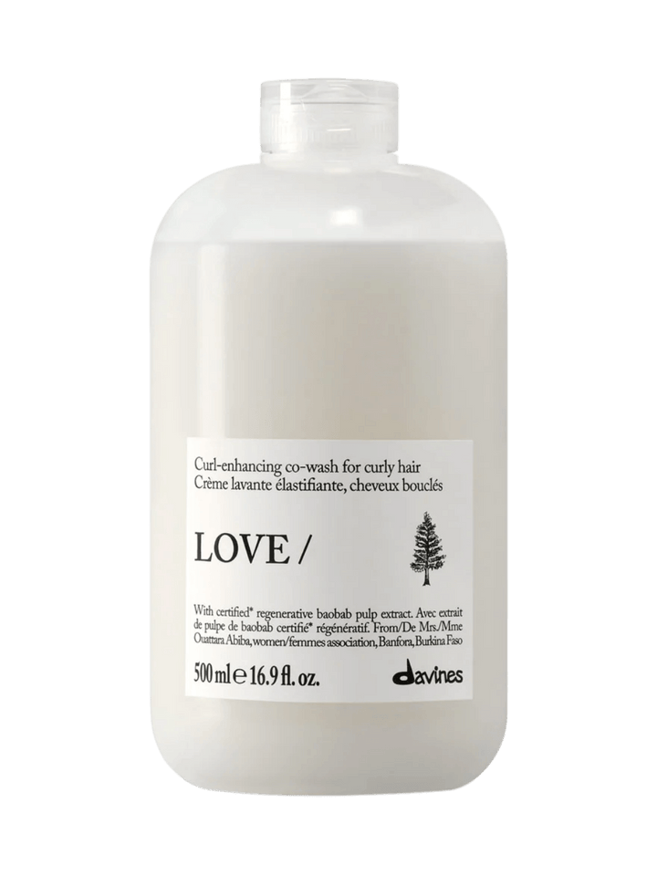 A 500 ml bottle of Davines LOVE CURL Co-Wash for curly hair | Twentyseven Toronto