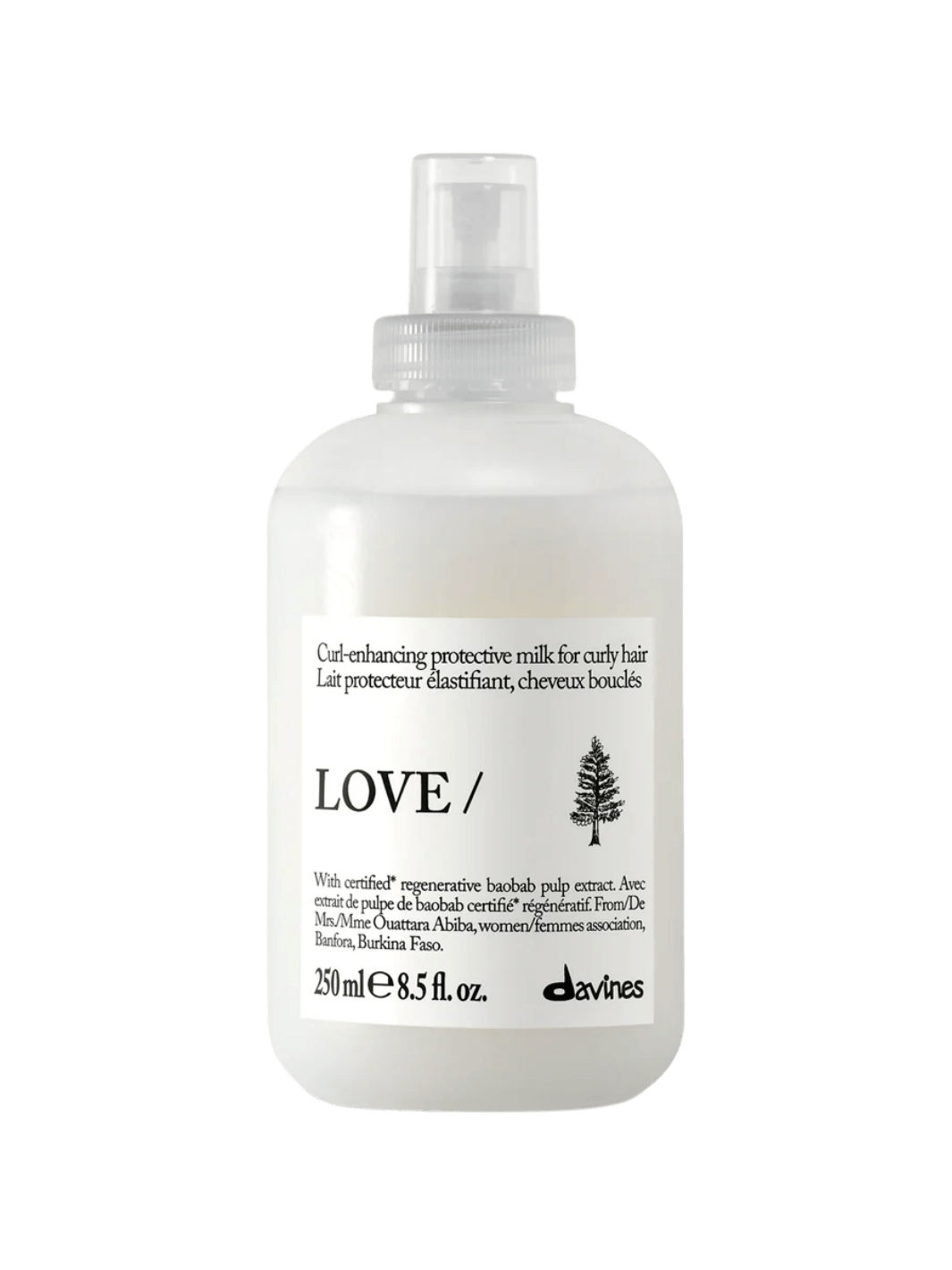 A 250 ml spray bottle of Davines LOVE CURL Enhancing Milk for curly hair | Twentyseven Toronto