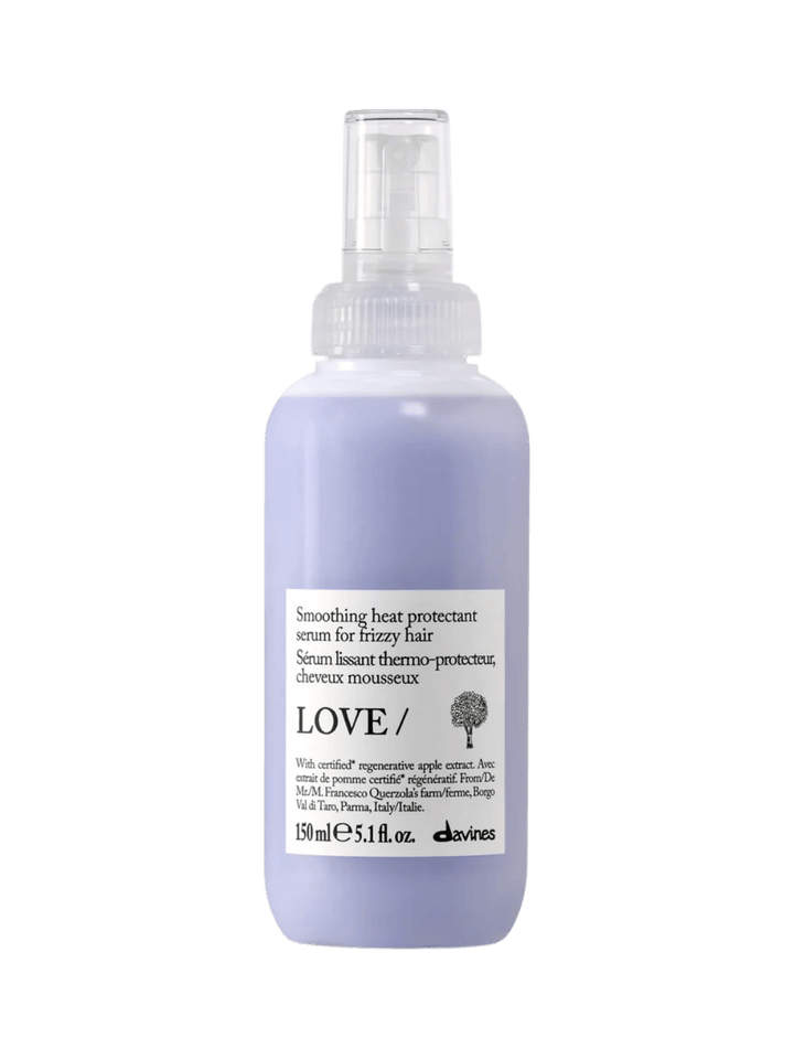A 150 ml spray bottle of Davines LOVE SMOOTHING Serum for frizzy hair | Twentyseven Toronto