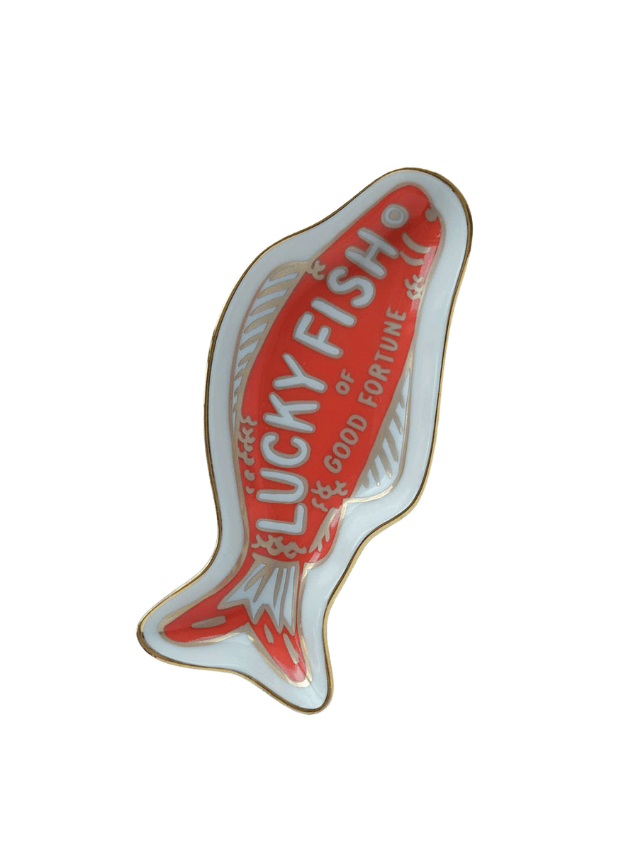 Idlewild Co. Fortune Fish porcelain trinket dish featuring a red lucky fish design with white detailing and gold trim on a white background | Twentyseven Toronto