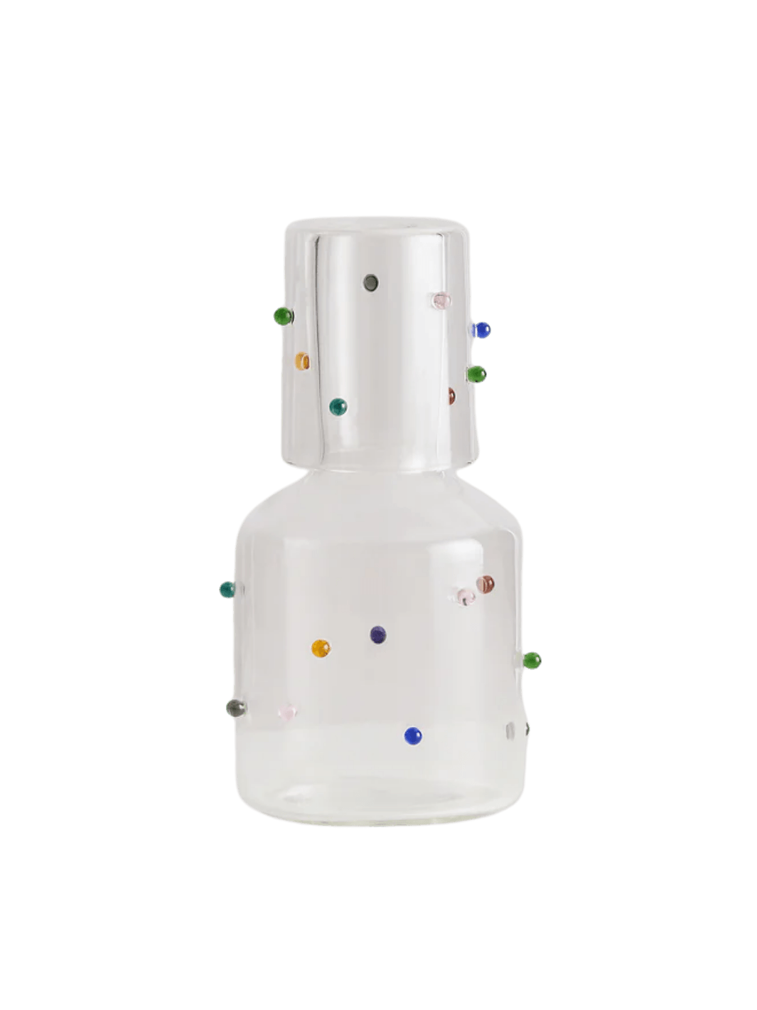 White 'Madame Pomponette' carafe from Maison Balzac with colorful decorative glass beads on a transparent background | Twentyseven Toronto