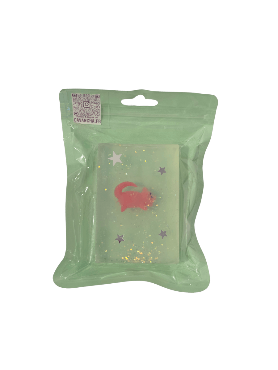 A clear bar of Cavancha Magic Glitter Soap - Pokemon, embedded with a small pink character charm and star glitter, packaged inside a light green pouch | Twentyseven Toronto
