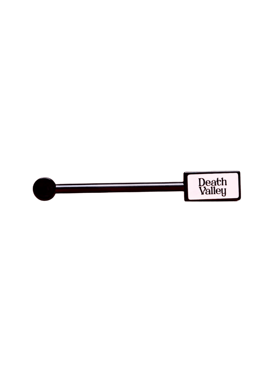 Magnetic wand for magnetic nail polish from Death Valley Nails with 'Death Valley' label on a transparent background | Twentyseven Toronto