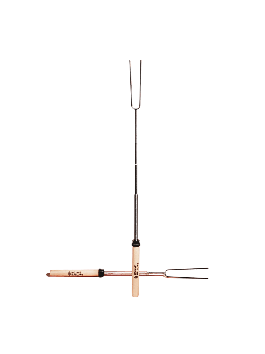 Two Mojave Mallows Marshmallow Skewer / Roasting Stick tools, with one standing vertically and the other resting horizontally | Twentyseven Toronto