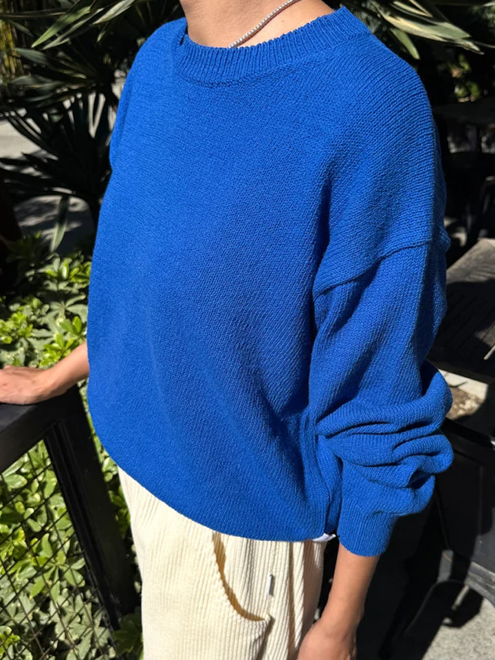 Side view of model wearing the Le Bon Shoppe Milo Cotton Sweater in Cobalt Blue, showing the relaxed fit | Twentyseven Toronto
