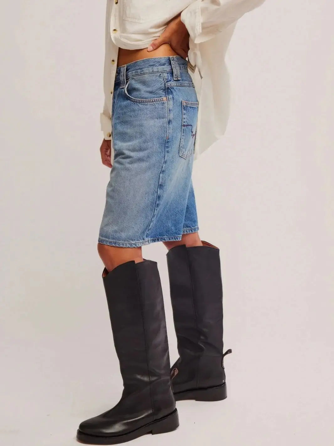 A side profile view highlights the structured denim hang, wide-leg cut, and high-rise waist of the Free People Montana Shorts in Haven | Twentyseven Toronto