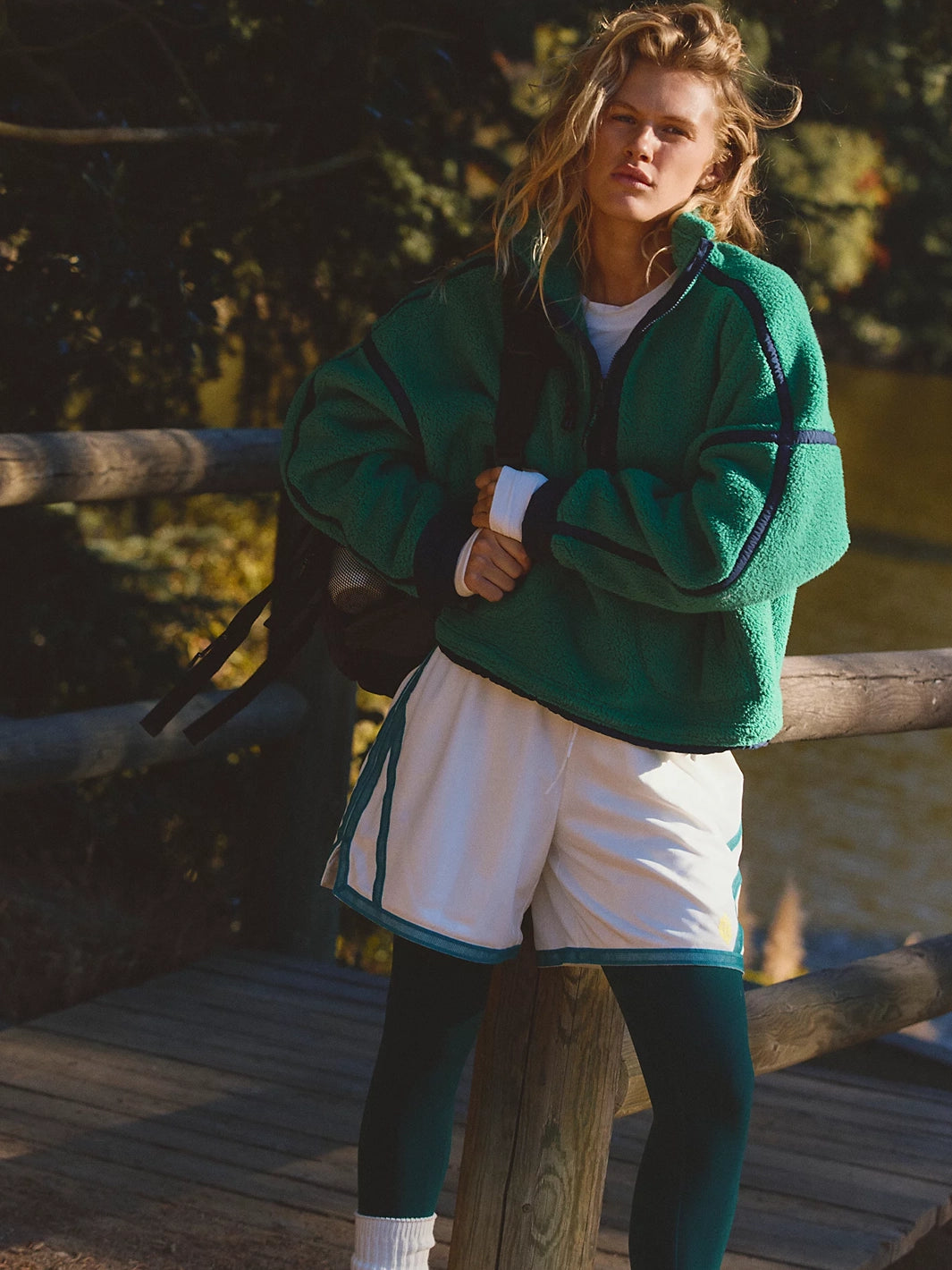 FP Movement Mountain High Half-Zip Fleece in green styled with athletic layers for an outdoor look | Twentyseven Toronto