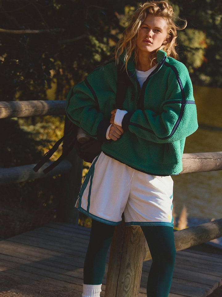 FP Movement Mountain High Half-Zip Fleece in green styled with athletic layers for an outdoor look | Twentyseven Toronto