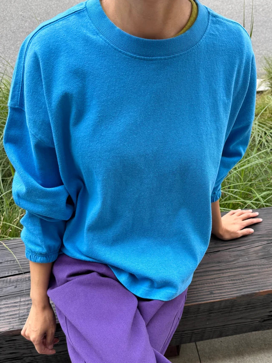 Le Bon Shoppe Model wearing the Le Bon Shoppe Naturelle Tee in French Blue with purple pants | Twentyseven Toronto