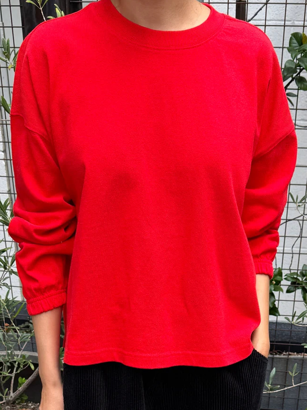 Front view of the Le Bon Shoppe Naturelle Tee in Tomato, showing the relaxed fit and elasticated cuffs | Twentyseven Toronto